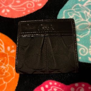 Coach wallet for women.